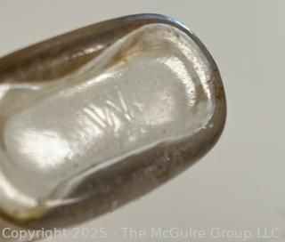 Group of antique glass bottles: various brands
