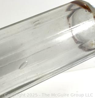Group of antique glass bottles: various brands