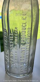 Group of six (6) antique glass bottles: various brands