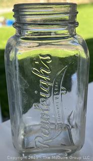 Group of six (6) antique glass bottles: various brands embossed