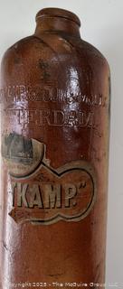 Group of antique glass bottles: various brands some with labels 