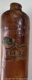 Group of antique glass bottles: various brands some with labels 