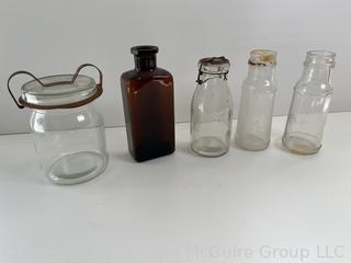 Group antique glass bottles: various brands