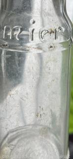 Group antique glass bottles: various brands