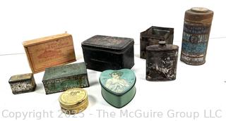 Selection of vintage product advertising tins, mostly home care related