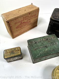 Selection of vintage product advertising tins, mostly home care related