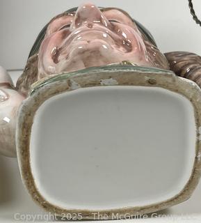 ???????? Eclectic grouping: Toby style teapot; matchsticks; abalone ice bucket; group of crystal salt trays?