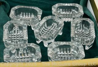 ???????? Eclectic grouping: Toby style teapot; matchsticks; abalone ice bucket; group of crystal salt trays?