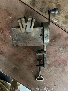 Collection of antique hand-cranked kitchen tools