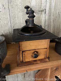 Collection of antique hand-cranked kitchen tools