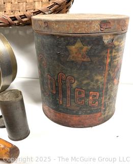 ????????  Eclectic grouping: metal tray; coffee tin; Hanging match holder; hack saw; alarm clock and wicker basket 