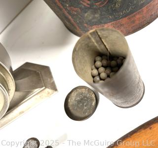 ????????  Eclectic grouping: metal tray; coffee tin; Hanging match holder; hack saw; alarm clock and wicker basket 