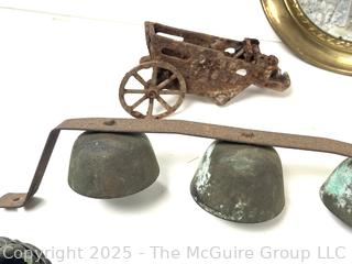???????? Eclectic grouping: Ford headlights; bells; pick-up sticks; sock darner form; odds and ends