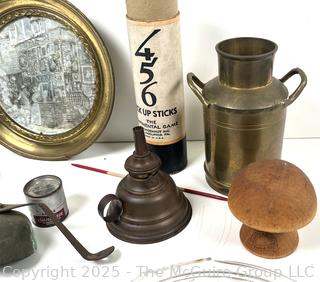 ???????? Eclectic grouping: Ford headlights; bells; pick-up sticks; sock darner form; odds and ends