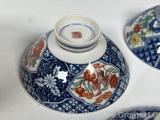 Set of Porcelain Asian Painted Rice Bowls and Spoons
