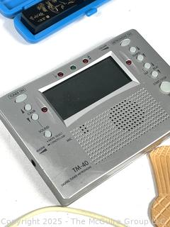 Grouping Including 1966 Barbie Twist'n'turn Doll, Apple iPOD Classic 3rd Generation (Model A1040), Farley's Chromatic-C Pocket Tones, HP 12C Calculator, Chinese Character Ink Stamp, TM-40 - Digital Tuner Metronome, Parker and Pelican Ink Bottles and Slide Viewer