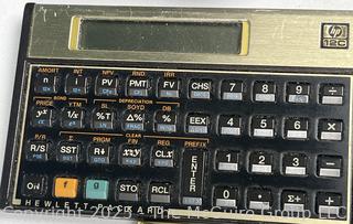 Grouping Including 1966 Barbie Twist'n'turn Doll, Apple iPOD Classic 3rd Generation (Model A1040), Farley's Chromatic-C Pocket Tones, HP 12C Calculator, Chinese Character Ink Stamp, TM-40 - Digital Tuner Metronome, Parker and Pelican Ink Bottles and Slide Viewer