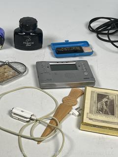Grouping Including 1966 Barbie Twist'n'turn Doll, Apple iPOD Classic 3rd Generation (Model A1040), Farley's Chromatic-C Pocket Tones, HP 12C Calculator, Chinese Character Ink Stamp, TM-40 - Digital Tuner Metronome, Parker and Pelican Ink Bottles and Slide Viewer