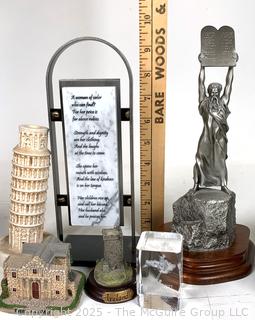 Collection of Travel Souvenirs Including Coin Banks and Figurines of Buildings