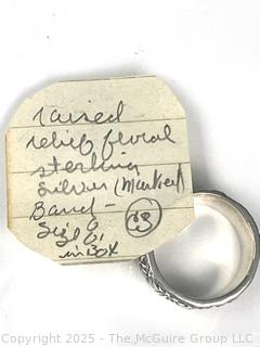 Sterling Silver Band Ring with Flower Relief