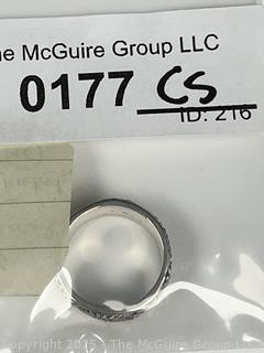 Sterling Silver Band Ring with Flower Relief