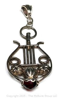 Sterling Silver Lyre Pendant with Garnet Finial Pendant