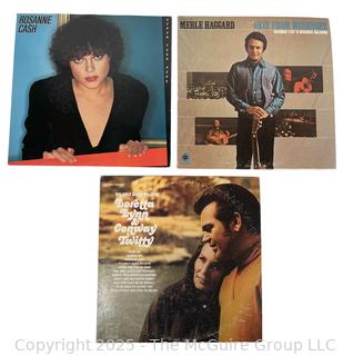 Three (3) Vinyl LP Records: Roseanne Cash, Merle Haggard, and Loretta Lynn & Conway Twitty