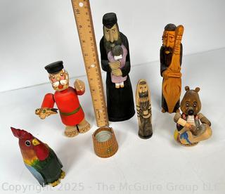 Collection of Carved Wooden Dolls