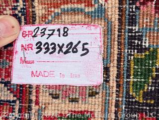 Hand Woven Wool Mashad Carpet on Red Ground.  103" x 132".