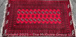 Hand-knotted Afghan Akhche Wool Rug on Red Ground. 40" x 76"