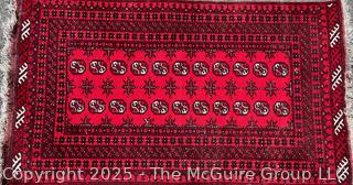 Hand-knotted Afghan Akhche Wool Rug on Red Ground. 40" x 76"
