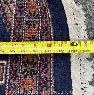 Hand-knotted Persian Runner Rug on Blue Ground.  39" x 121"