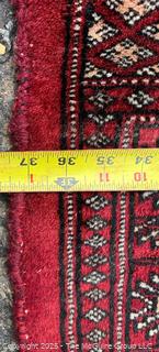 Hand-knotted Southwestern Bokhara Area Rug on Red Ground. 37" x 62"