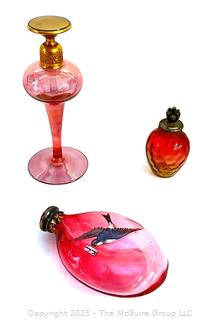 Three (3) Decorative Pieces of Ruby Glass. Includes Pinched Rose Bowl, Perfume Bottle and Snuff Bottle.