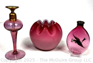 Three (3) Decorative Pieces of Ruby Glass. Includes Pinched Rose Bowl, Perfume Bottle and Snuff Bottle.
