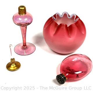 Three (3) Decorative Pieces of Ruby Glass. Includes Pinched Rose Bowl, Perfume Bottle and Snuff Bottle.