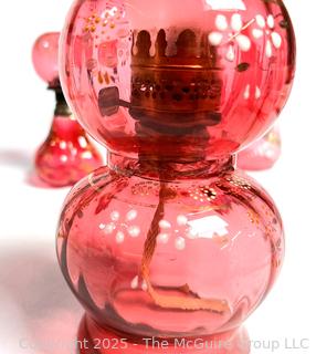 Two (2) Victorian Cranberry Glass Oil Lamps and Two (2) Pieces of Mary Gregory Style Painted Cranberry Glass