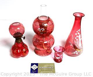 Two (2) Victorian Cranberry Glass Oil Lamps and Two (2) Pieces of Mary Gregory Style Painted Cranberry Glass