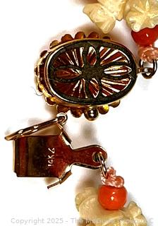 Turned and Carved Graduated Bone and Coral Bead Necklace with 14KT Yellow Gold Clasp.  22"