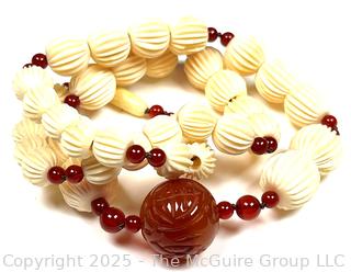 Graduated Carved Bone Bead Necklace with Carnelian Stone Center