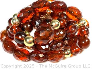 Faceted Amber Beads with 14KT Yellow Gold Clasp and Accent Beads. 20"