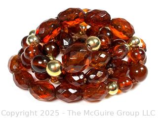 Faceted Amber Beads with 14KT Yellow Gold Clasp and Accent Beads. 20"