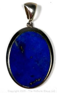 Sterling Silver with Lapis Lazuli Center Pendant.