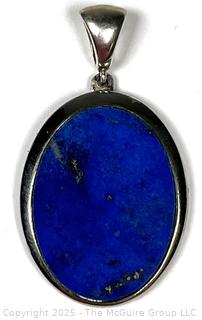 Sterling Silver with Lapis Lazuli Center Pendant.