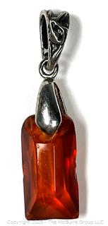 Hand Carved Amber Stone Pendant on Silver Bale. 