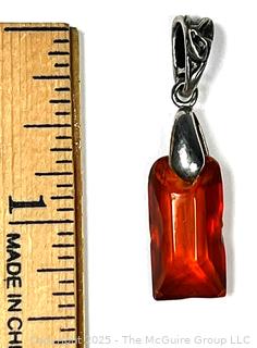Hand Carved Amber Stone Pendant on Silver Bale. 