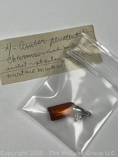 Hand Carved Amber Stone Pendant on Silver Bale. 