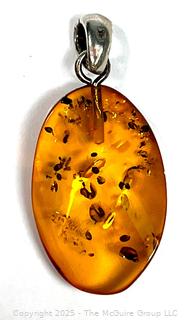 Polished Amber Pendant on Sterling Silver Bale