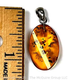 Polished Amber Pendant on Sterling Silver Bale