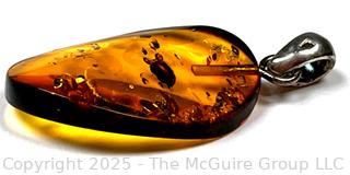 Polished Amber Pendant on Sterling Silver Bale
